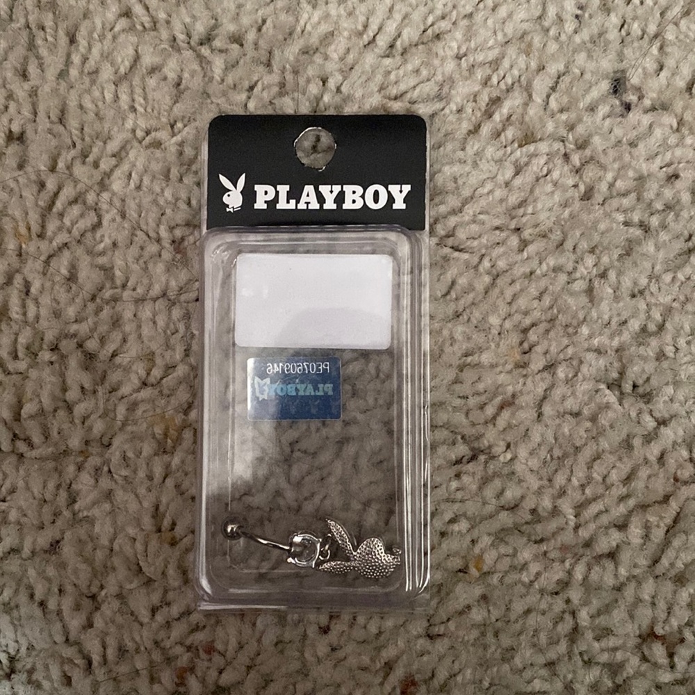 New Playboy bunny belly button piercing